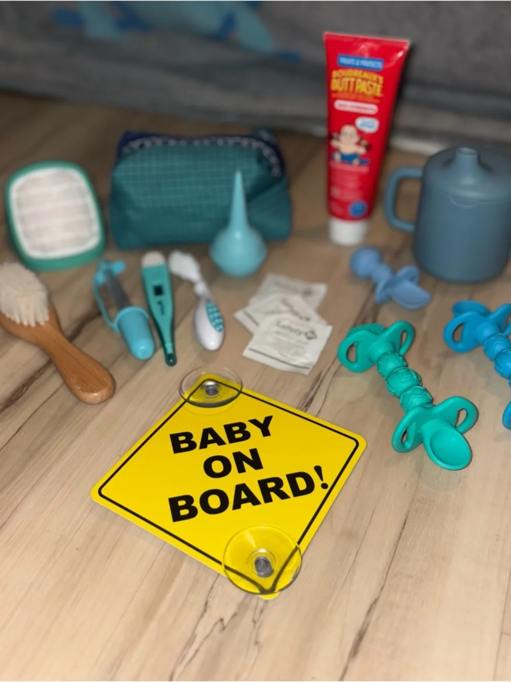 Baby Bundle including Baby On Board Car Window Sign, brushes, first aid travel